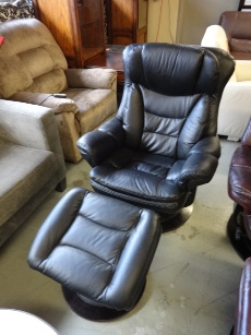 Southern Motion Black Leather Swivel Recliner with Ottoman
