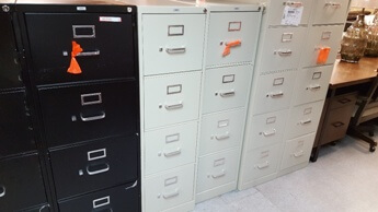 Hon 4-Drawer Locking Metal File Cabinet in Putty Finish (blemish)