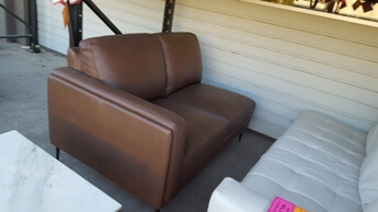 Chateau Dax Brown Leather One-Arm Loveseat with Squared Arm
