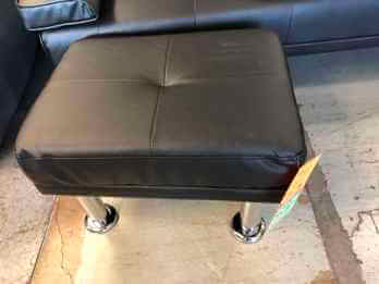 Ebello Black Faux Leather Ottoman