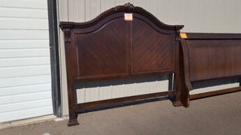 New Classic Capuccino Finish King/Cal King Headboard with Carved Accents