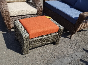 Laguna Brown All-Weather Wicker Outdoor Ottoman with Terracotta Cushion