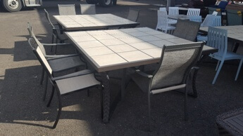 Sunbrella Light Brown Tile Top Dining Table with PVC Wicker Wrapped Base